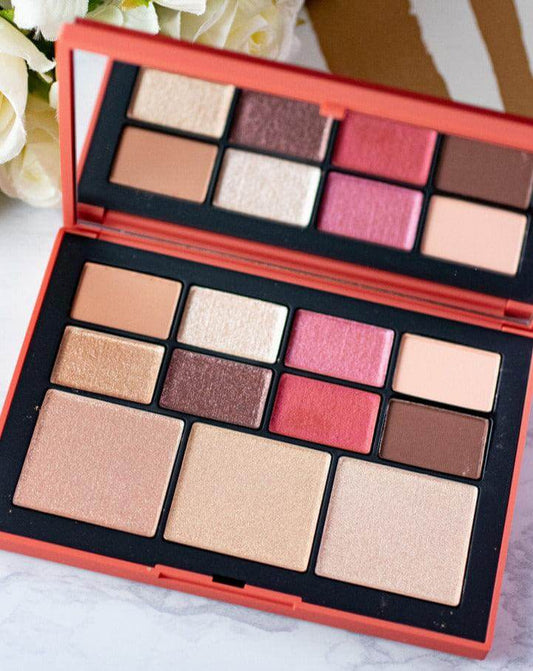 Nars Euphoria Face Palette showcasing eyeshadows and highlighters in a vibrant, multi-finish compact.