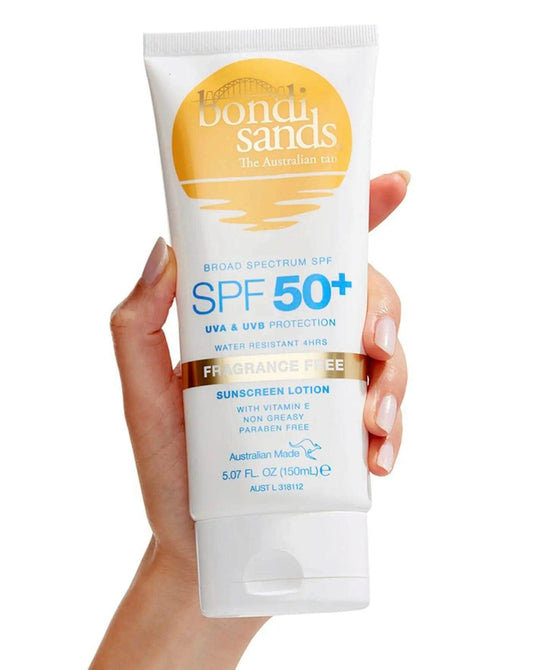 Bondi Sands Sunscreen Lotion SPF50+ in hand with UVA/UVB protection, fragrance-free, water resistant for 4 hours, 150ml.