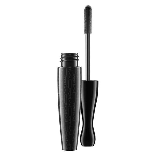 MAC In Extreme Dimension 3D Black Mascara with molded brush for dramatic volume and curl, enhancing lashes from root to tip.