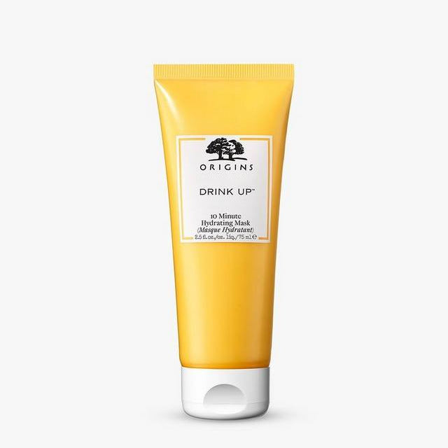 Yellow Origins skincare product on a white background