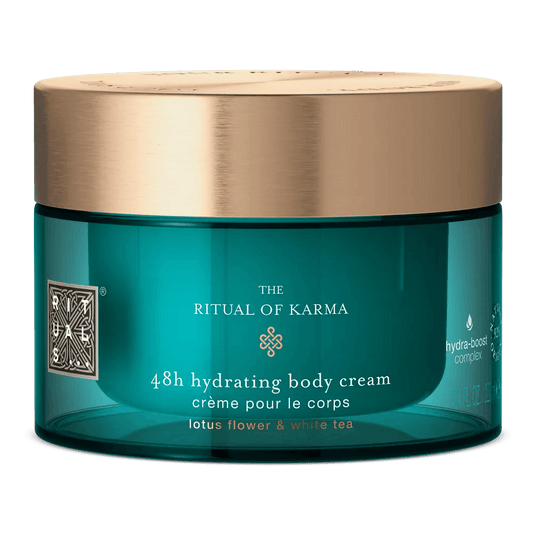 RITUALS The Ritual of Karma 220ml hydrating body cream with lotus flower and white tea in a luxurious jar.