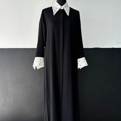 Elegant NED collar dress adorned with sparkling rhinestones for a sophisticated, stylish evening look.