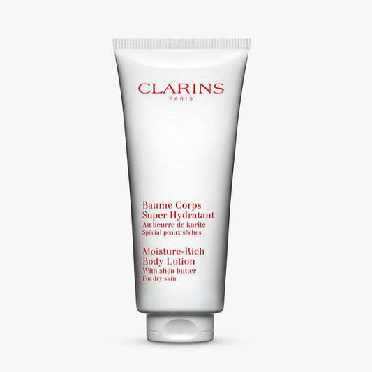 Clarins Moisture Rich Body Lotion tube featuring shea butter for dry skin hydration.