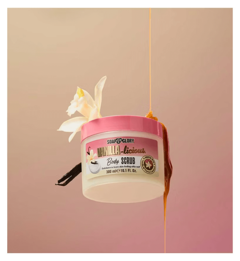 Soap & Glory Vanilla-licious Body Scrub with flower and honey, 300ml container for indulgent bath experience.