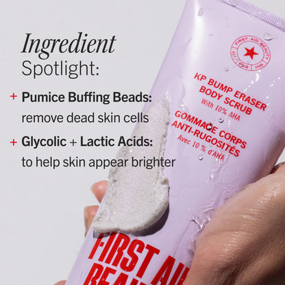 First Aid Beauty Body scrub with pumice buffering beads and glycolic/lactic acids, held by a hand.
