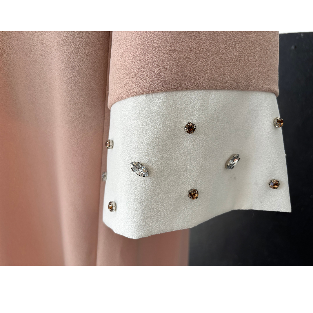 Elegant NED collar dress adorned with sparkling rhinestones for a sophisticated, stylish evening look.