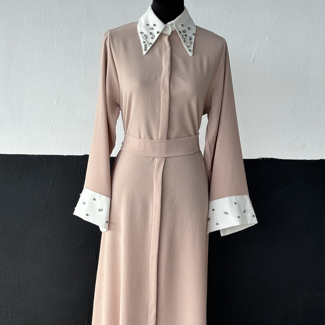 Elegant NED collar dress adorned with sparkling rhinestones for a sophisticated, stylish evening look.