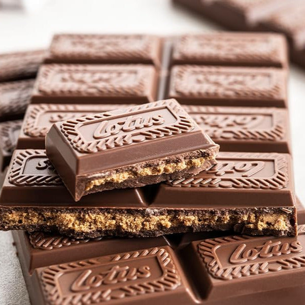 Chocolate bars with a visible filling on a light surface