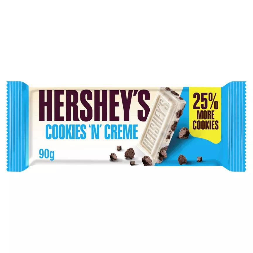 Hershey's Cookies 'n' Creme 90g bar with 25% more cookies, featuring a blend of white chocolate and cookie bites.