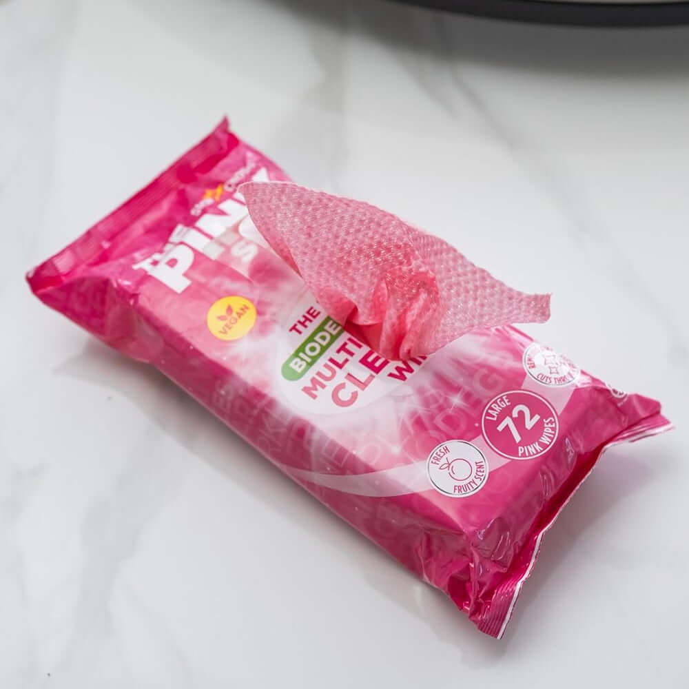 The Pink Stuff biodegradable multi-purpose cleaning wipes package, showcasing a large pink wipe for tough stains.
