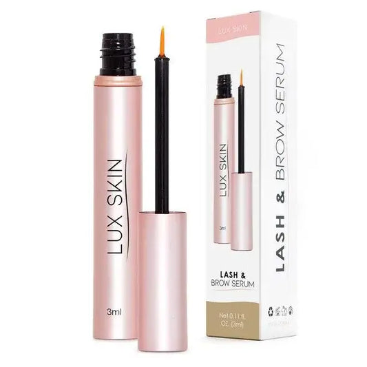 LUX SKIN® Lash & Brow Growth Serum with applicator for enhancing lashes and brows, packaged elegantly.