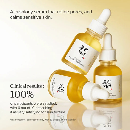 Three skincare serum bottles with droppers on a reflective surface against a yellow background.