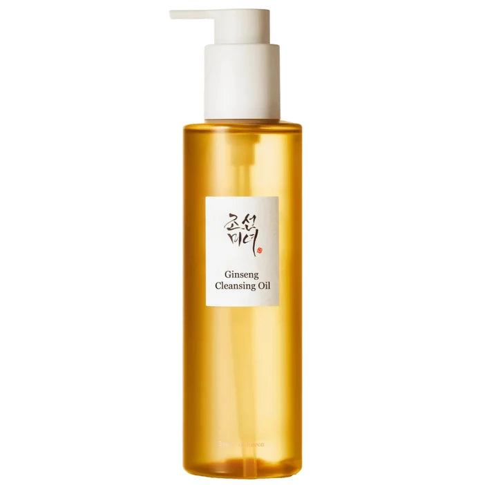 A bottle of Ginseng Cleansing Oil with a white pump dispenser and a white label featuring Korean script and the English text 'Ginseng Cleansing Oil'. The bottle is made of translucent amber-colored plastic, showing the golden oil inside.