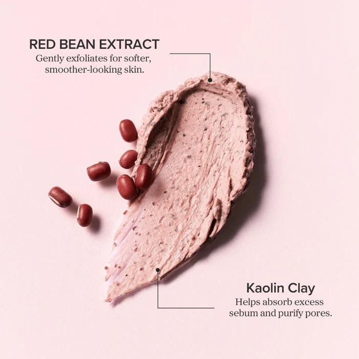 Cosmetic product with red bean extract and kaolin clay on a light pink background