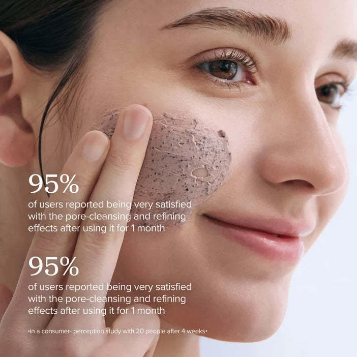 Woman applying a facial scrub with text about user satisfaction rates.
