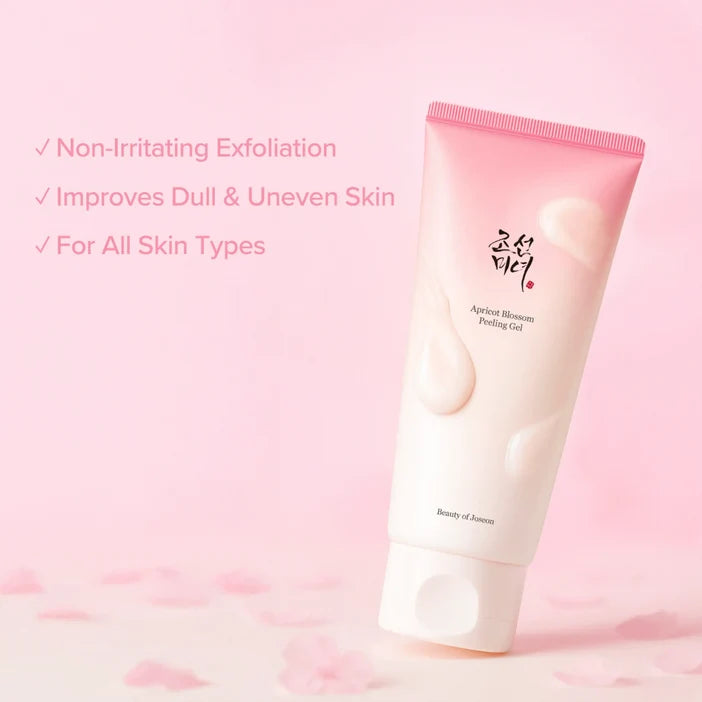 Beauty of Asana apricot blossom exfoliating facial gel in a pink and white squeeze tube, set against a soft pink background with decorative text highlighting its benefits.