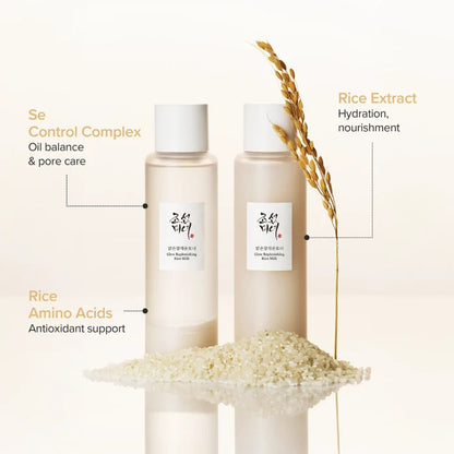 Two skincare bottles with rice extract and amino acids on a light background