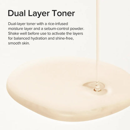 Dual-layer toner with text explaining its features on a white background