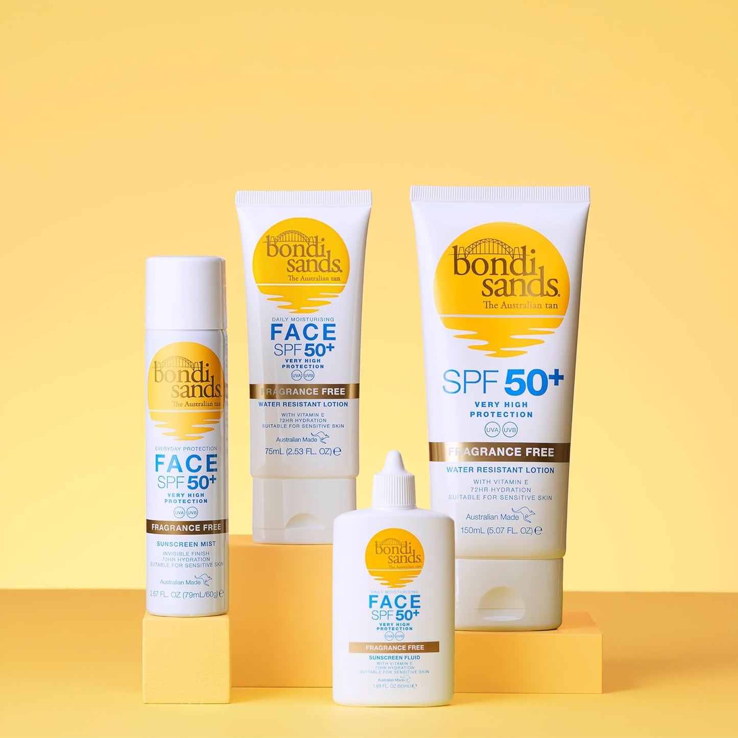 Collection of Bondi Sands sun care products on a yellow background
