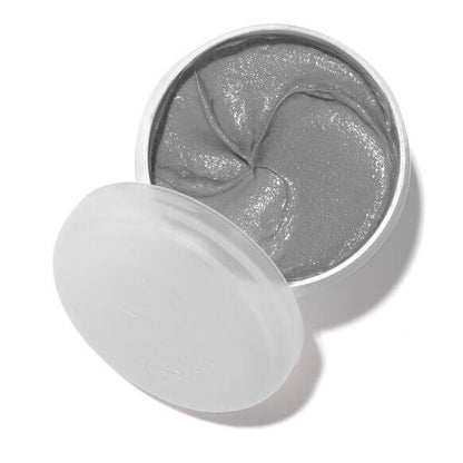 Silver gel pads in a white container on a white background