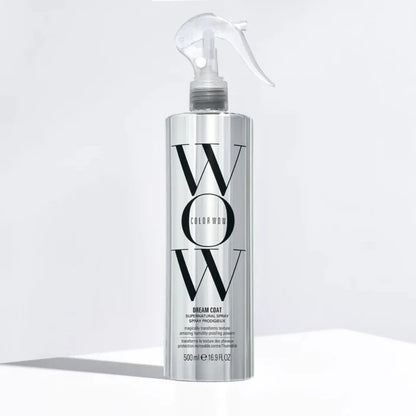 Silver bottle of WOW Color Coat on a white background