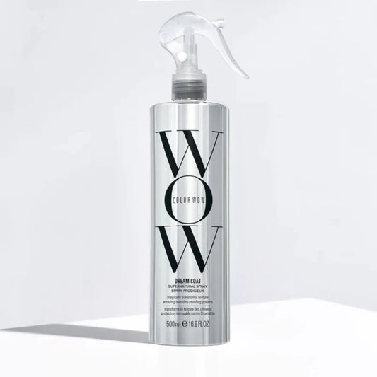 Silver bottle of WOW Color Coat on a white background