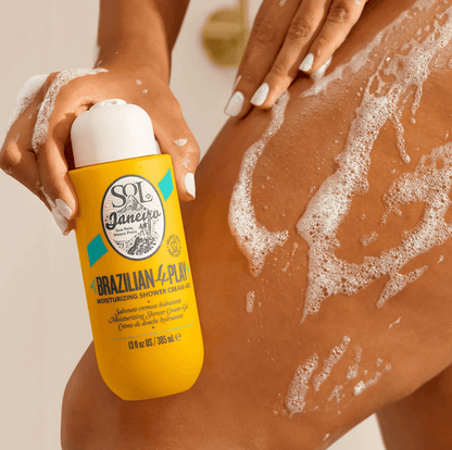 Sol de Janeiro Brazilian 4 Play Moisturizing Shower Cream-Gel in use on skin, featuring luxurious foam and hydration.