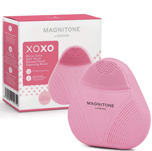 Magnitone XOXO SoftTouch Silicone Cleansing Brush in pink with packaging, designed for gentle skin care and deep cleansing.
