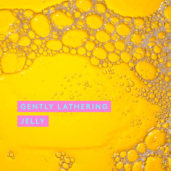 Drunk Elephant Yellow jelly with bubbles and 'Gently Lathering Jelly' text on a yellow background