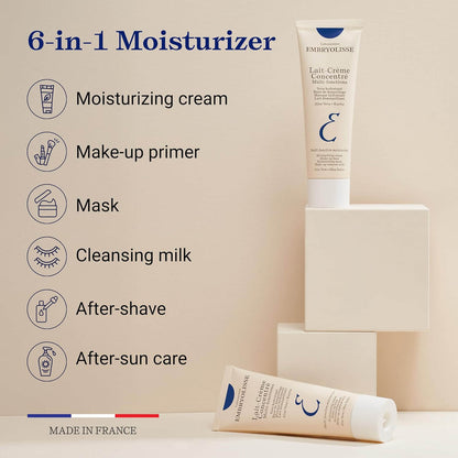 Two tubes of Embryolisse  moisturizer with product features listed on a beige background