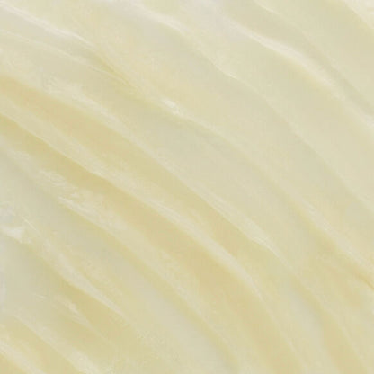 Close-up of a light beige marble texture for Emma Hardie Moringa Cleansing Balm