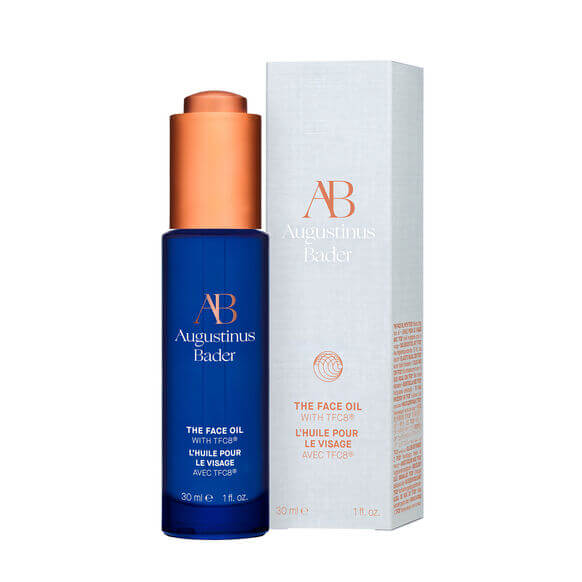 AUGUSTINUS BADER The Face Oil 30ml in blue bottle with copper cap and white box, luxury skincare for radiant skin.