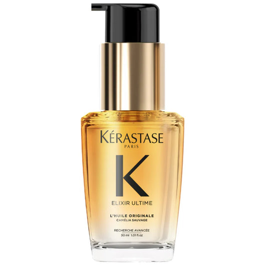 Kérastase Elixir Ultime hair oil bottle on a white background