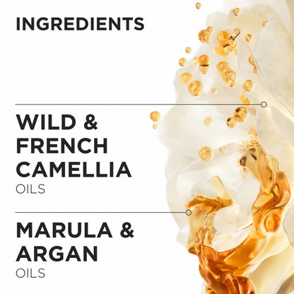 Kérastase Product ingredients list with visual of oils and flowers on a white background