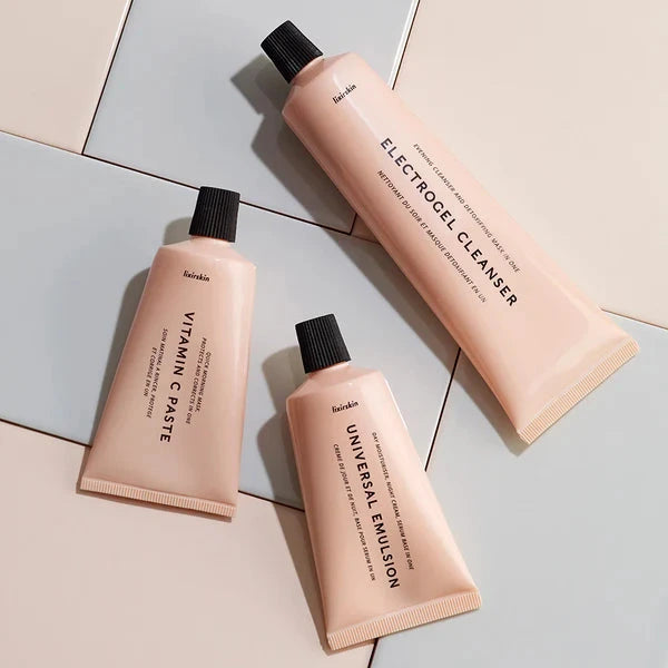 Three Lixirskin products on a light gray surface