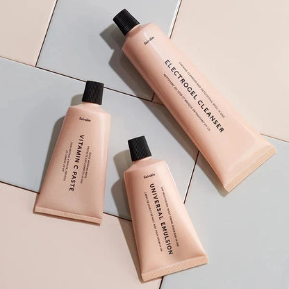 Three Lixirskin products on a light gray surface