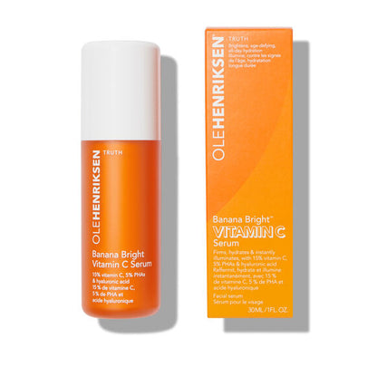 Orange serum bottle and packaging with 'Ole Henriksen' branding on a white background