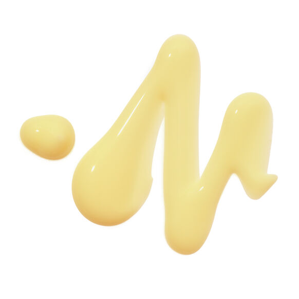 Yellow liquid droplets on a white background