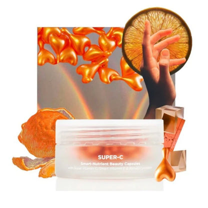 Oskia Super-C beauty capsules with orange slices and a hand holding an orange against a colorful abstract background.