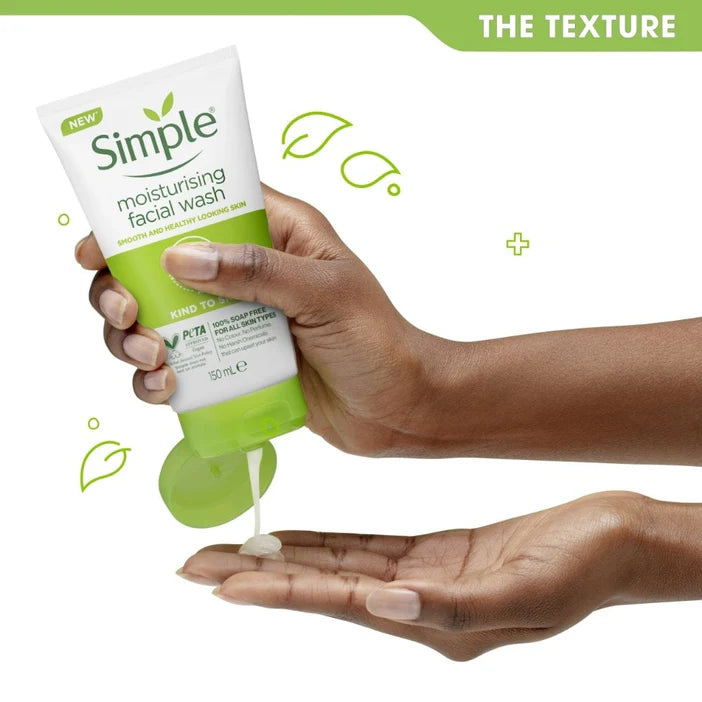 Hand holding a tube of Simple moisturising facial wash with product being squeezed onto another hand.