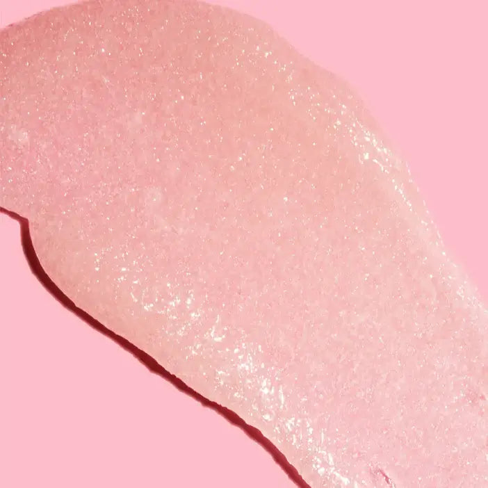 TREE HUT Sugar Scrub Moroccan Rose shown in a pink texture, providing gentle exfoliation for radiant skin.