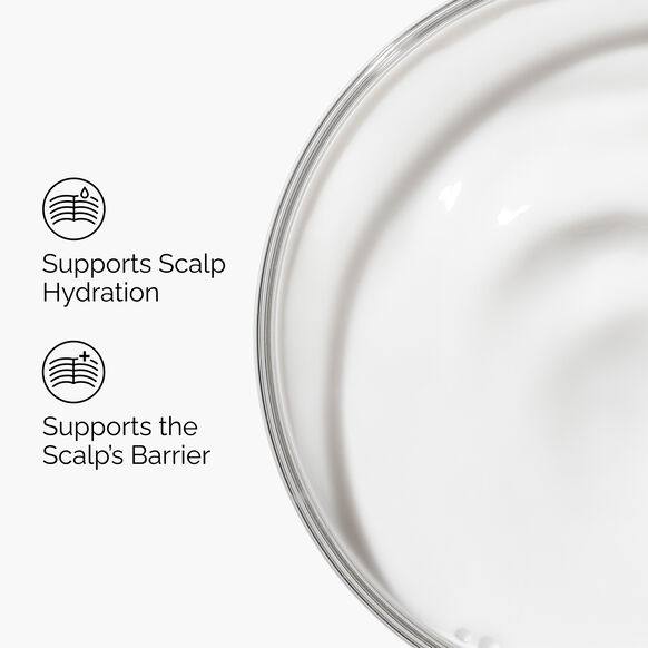 The Ordinary Close-up of a clear container with text indicating it supports scalp hydration and barrier.