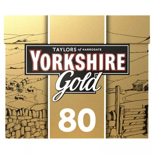 Yorkshire Gold tea box featuring 80 tea bags, showcasing a golden design and scenic illustrations.