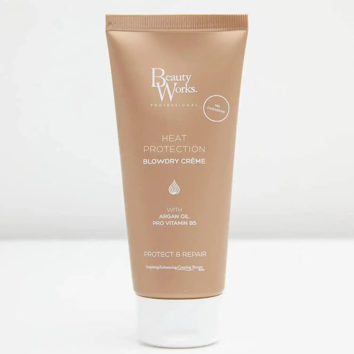 Beauty Works Blowdry Crème 100ml with argan oil, heat protection for healthy, bouncy hair, in a sleek tube packaging.