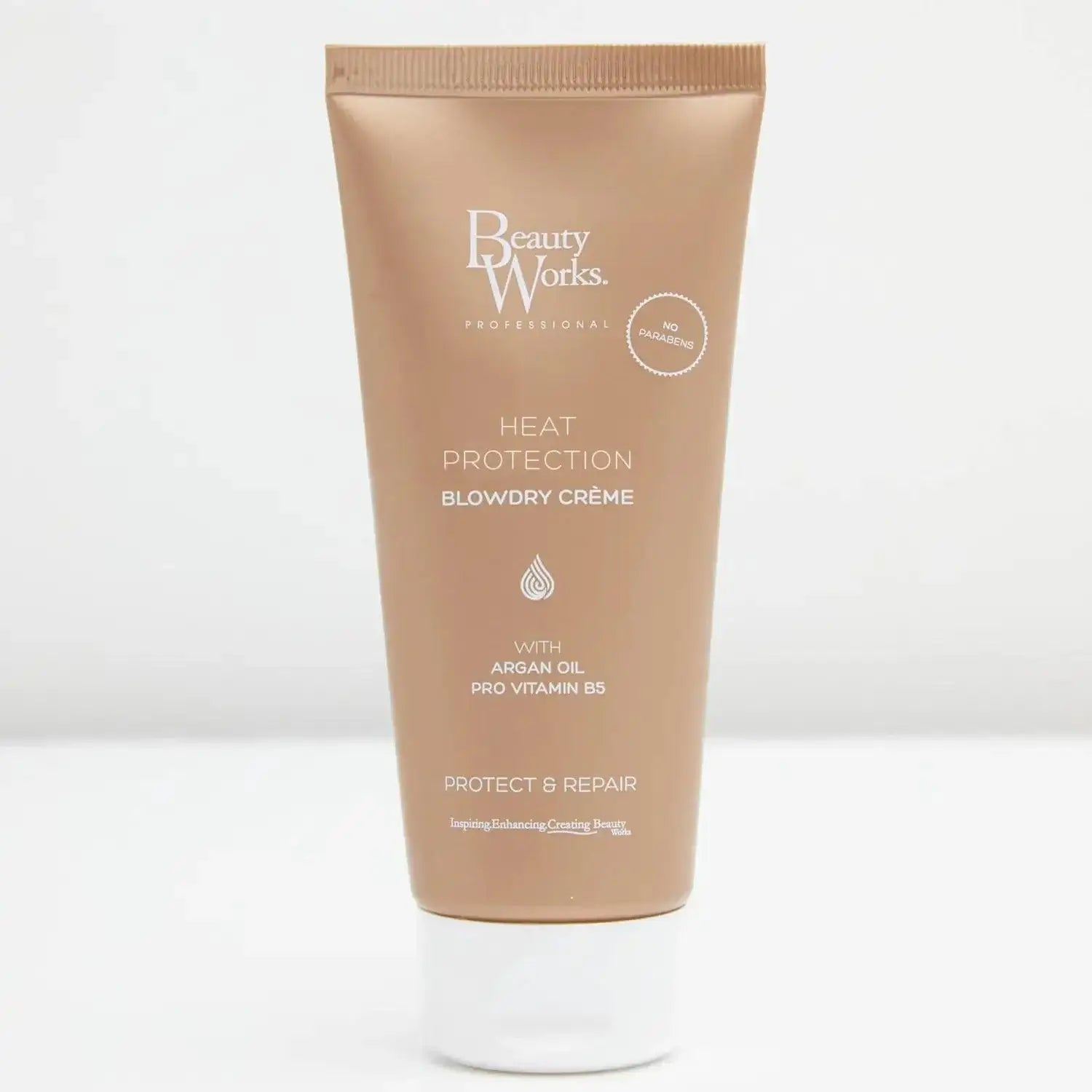 Beauty Works Blowdry Crème 100ml with argan oil, heat protection for healthy, bouncy hair, in a sleek tube packaging.