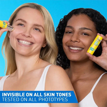 Two women using a sunscreen stick with a blue background and text about skin tones.