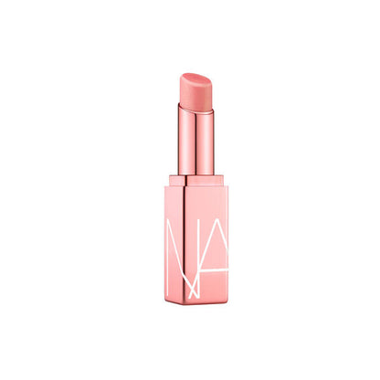 Pink lipstick with NARS logo on a white background