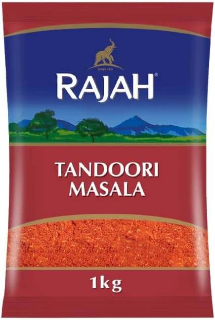 Rajah Tandoori Masala 1kg pack featuring vibrant red spices for authentic Indian cuisine.