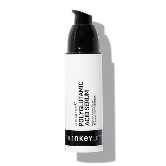 Skincare serum bottle with black pump on a white background, featuring 'The Inkey List' brand.