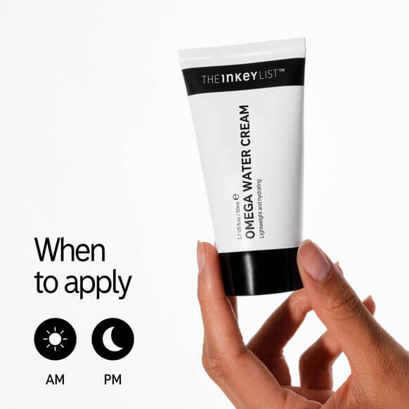 Hand holding THE INKEY LIST Omega Water Cream tube, showing when to apply in AM and PM for hydration.